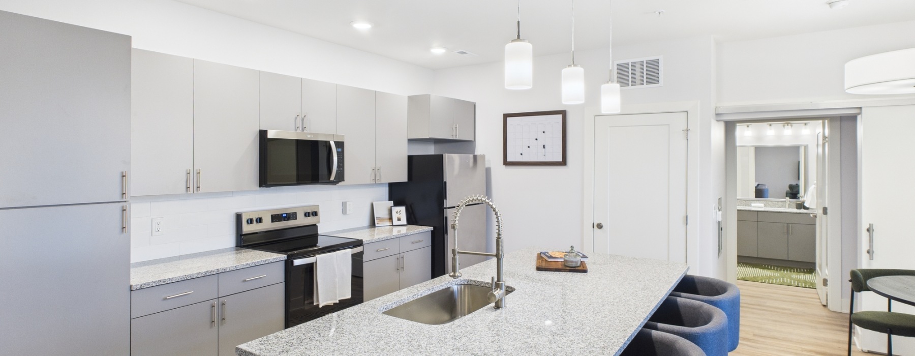 Large kitchen with island and barstools