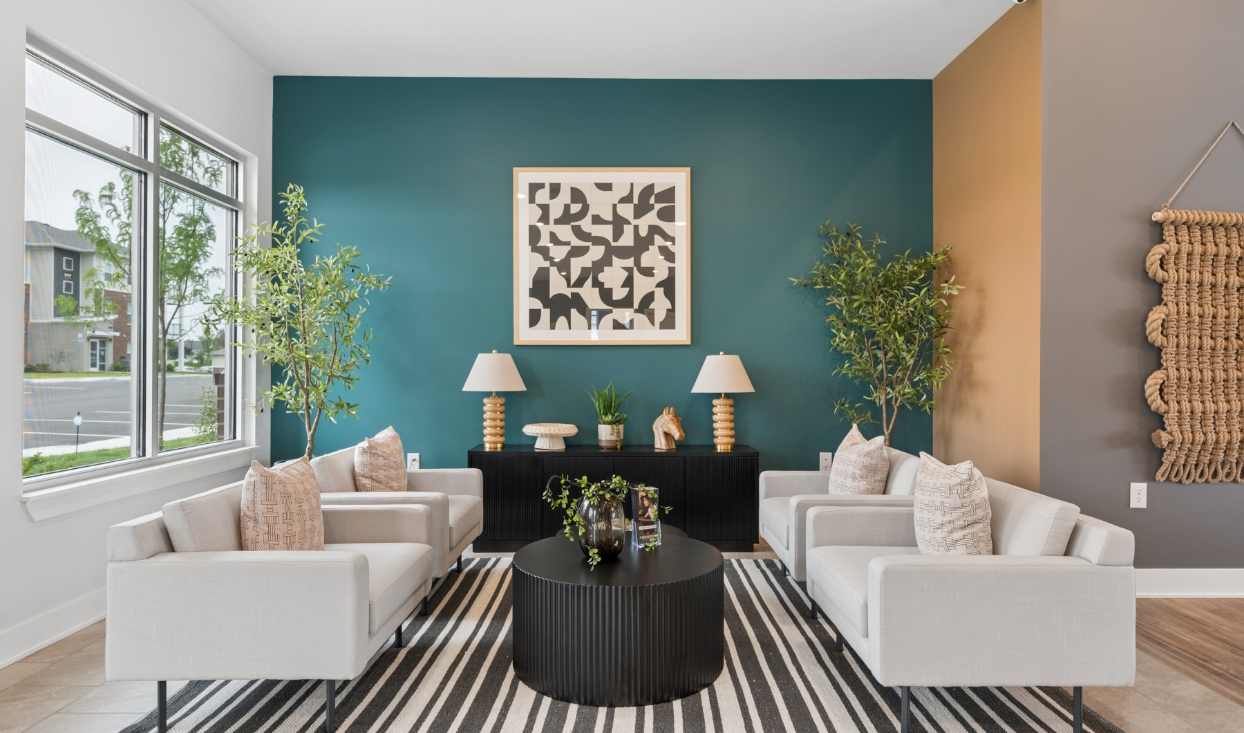 leasing office with tables and sofas