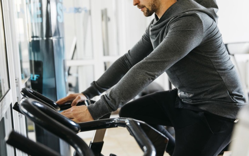 a man on a spin bike