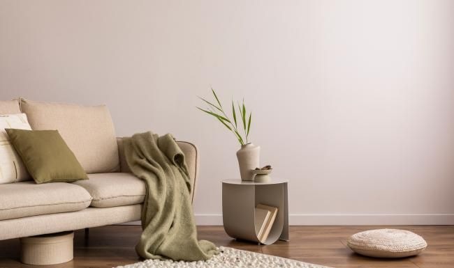 Find your perfect fit at Foundry at Heartland Crossing a couch and a plant on a table